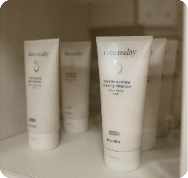 Face Reality cleanser and skincare products on a shelf